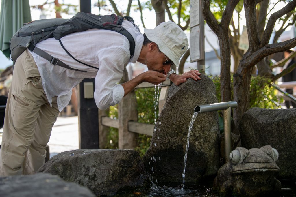 Drinking from a water well in Matsumoto city, Nagano Japan